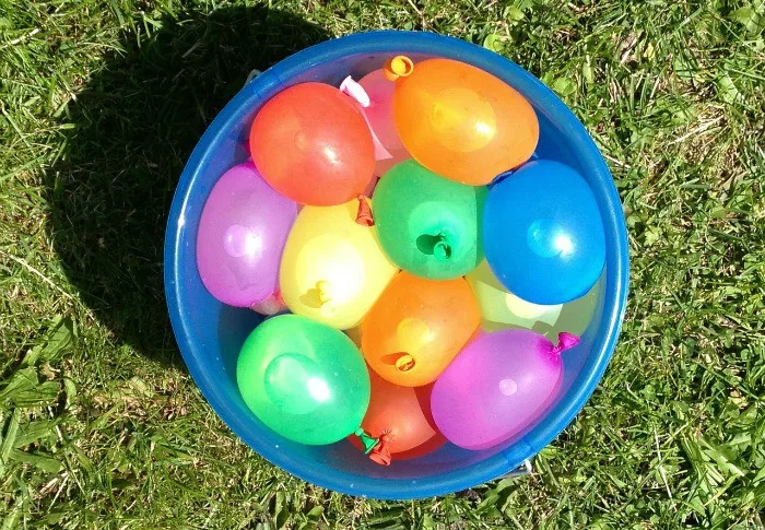 Water play in the backyard with water balloons