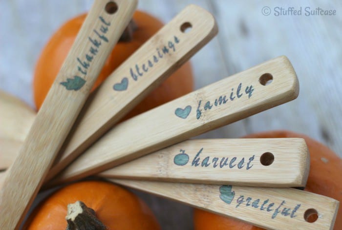 Stencil special words representing Thanksgiving on your serving utensils to dress up your holiday table | StuffedSuitcase.com