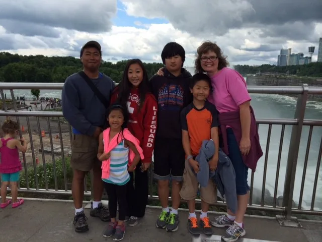 Carol with her family at Niagara Falls