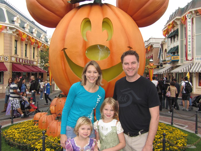 family photo at disneyland in october