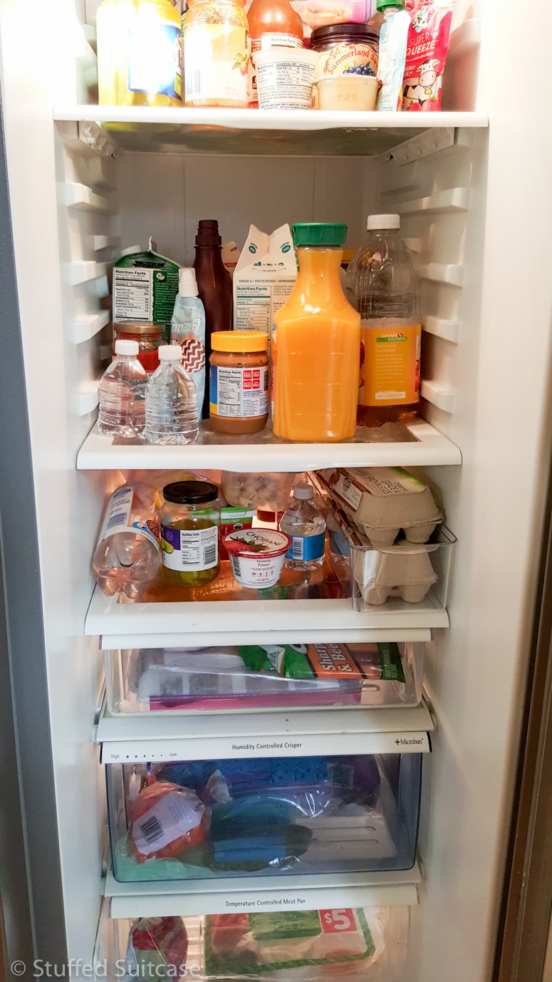 Our messy fridge before the refrigerator organization