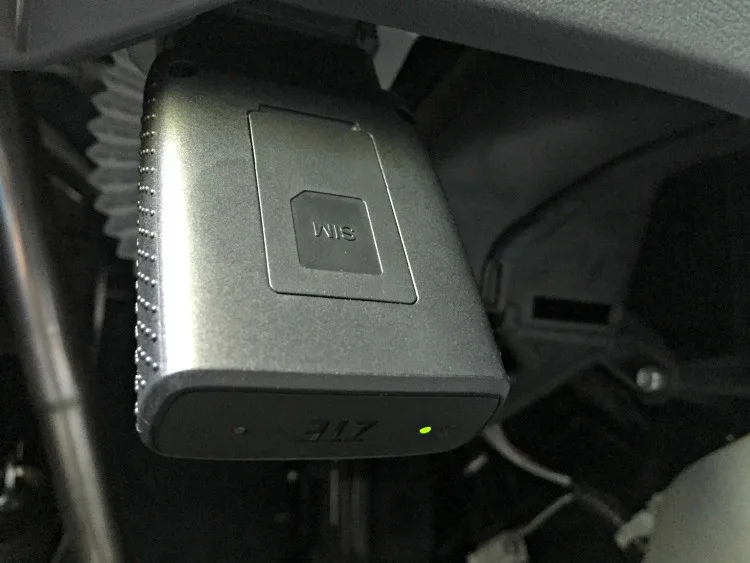 ZTE Mobley plugged into the OBD-II port on a Honda Odyssey
