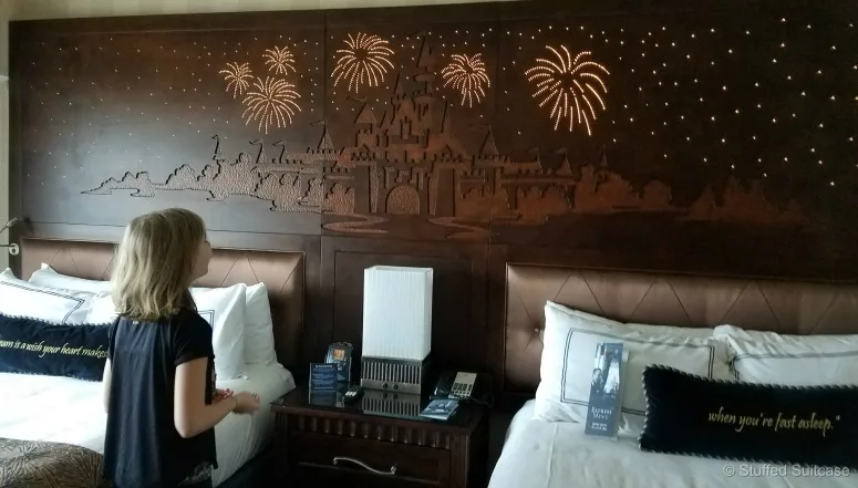 The Disneyland Hotel has fun light up headboards in their rooms - do you see the hidden Mickey? | © Stuffed Suitcase