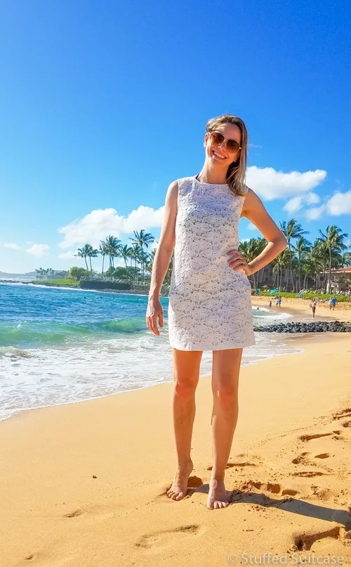Hanging at Poipu Beach in Kauai, Hawaii in my Vacay perfect lace dress as a beach cover up. © Stuffed Suitcase