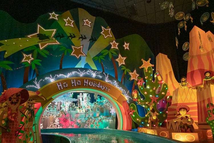 it's a small world holiday ride at Disneyland christmas