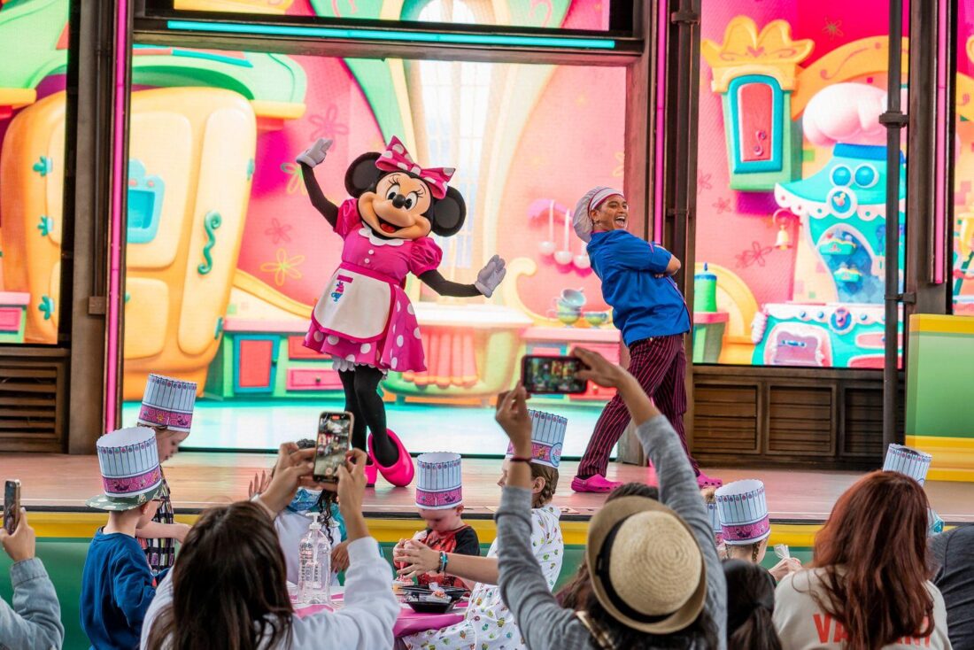 minnie on stage for Alice's Unbirthday Party event for 2022 Disneyland Food & Wine Festival