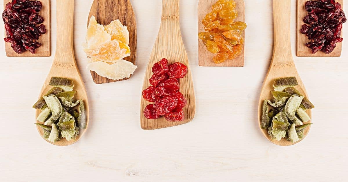 dried fruit on spoons