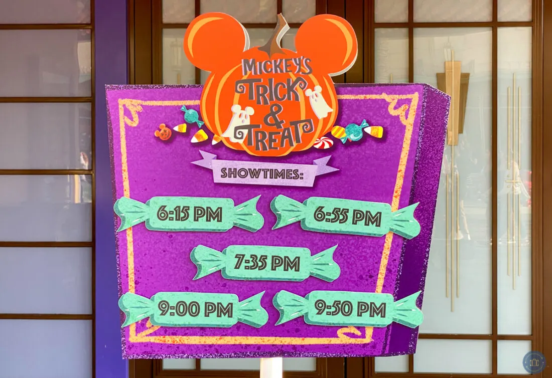 sign with showtimes for mickey's trick and treat show