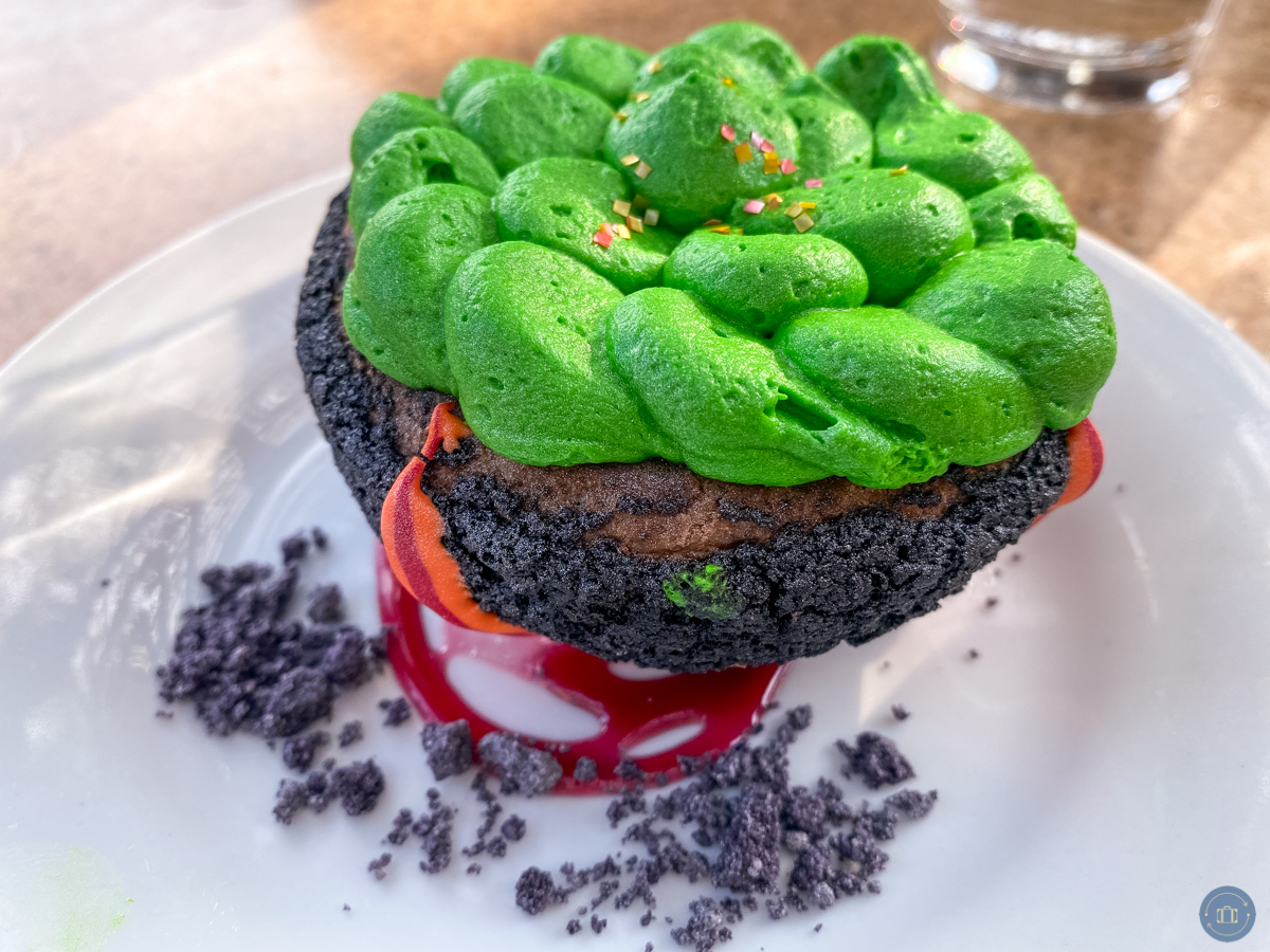 evil cauldron dessert chocolate cake with green frosting