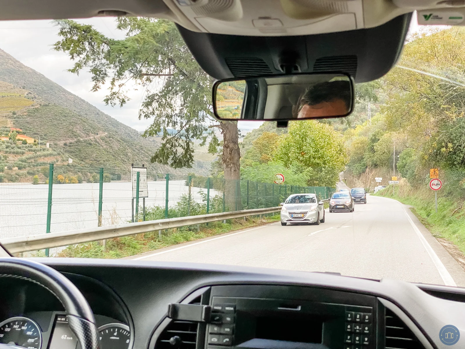 view from backseat of hired driver in douro valley portugal