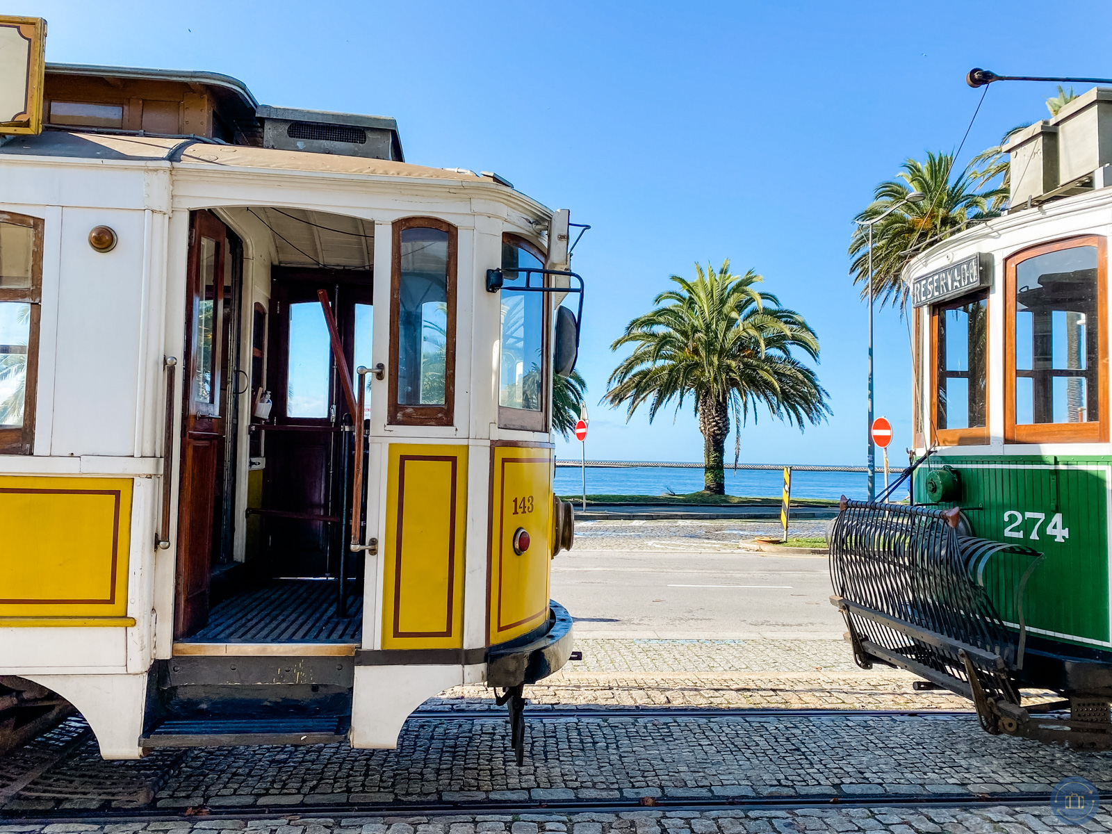 trams on street in porto portugal
