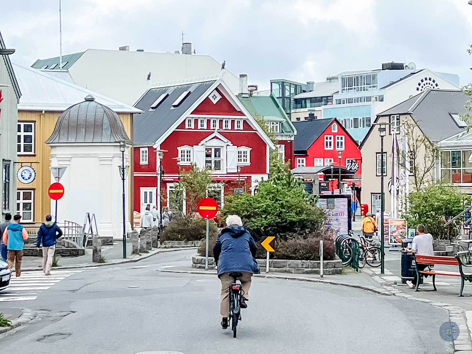 guy on bike on street during one day in reykjavik itinerary