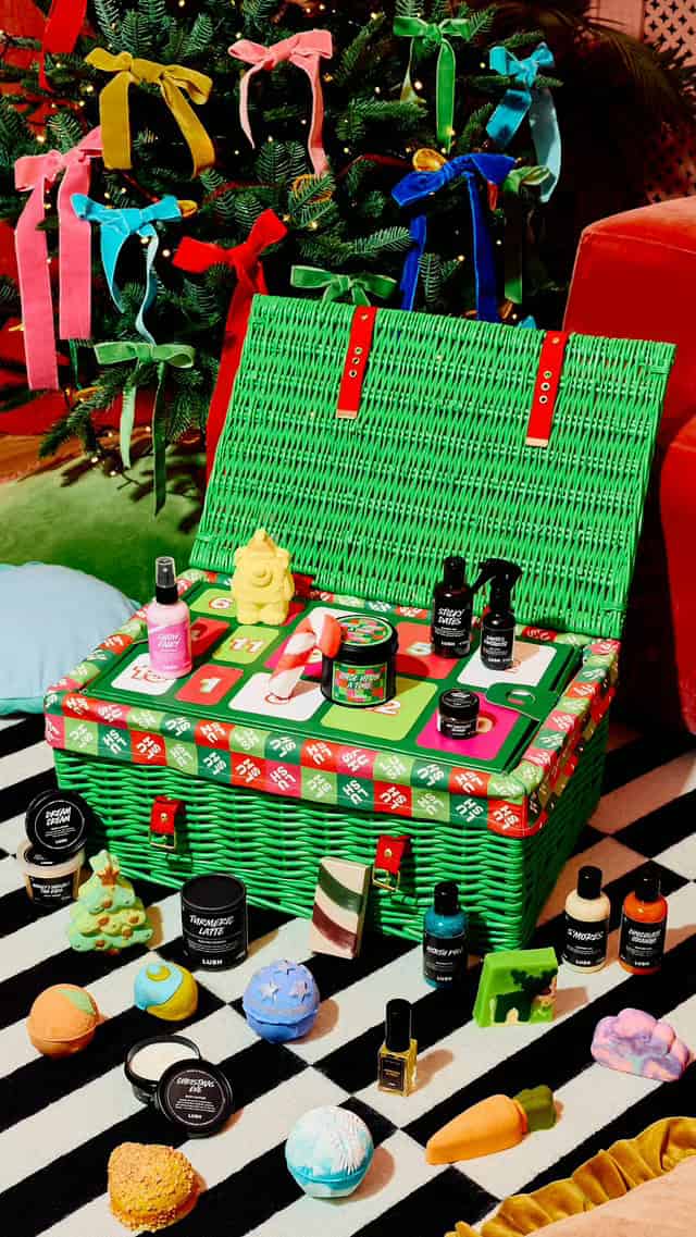 lush advent calendar in wicker basket with 25 full size body care products