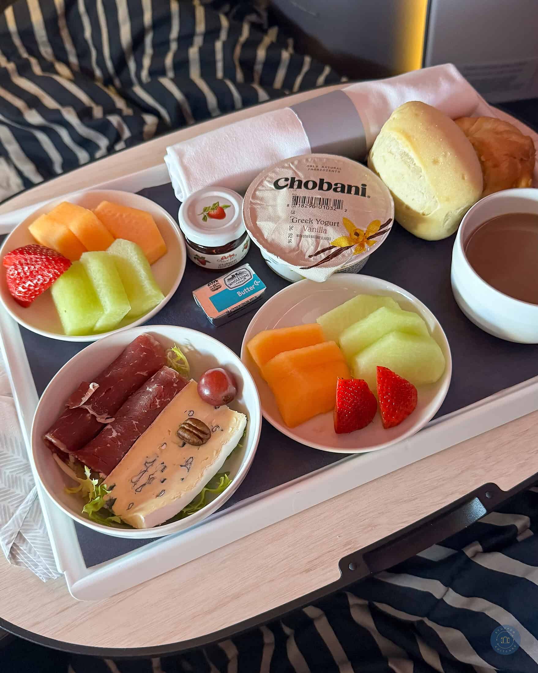 breakfast meal aboard finnair business class with double fruit instead of the frittata
