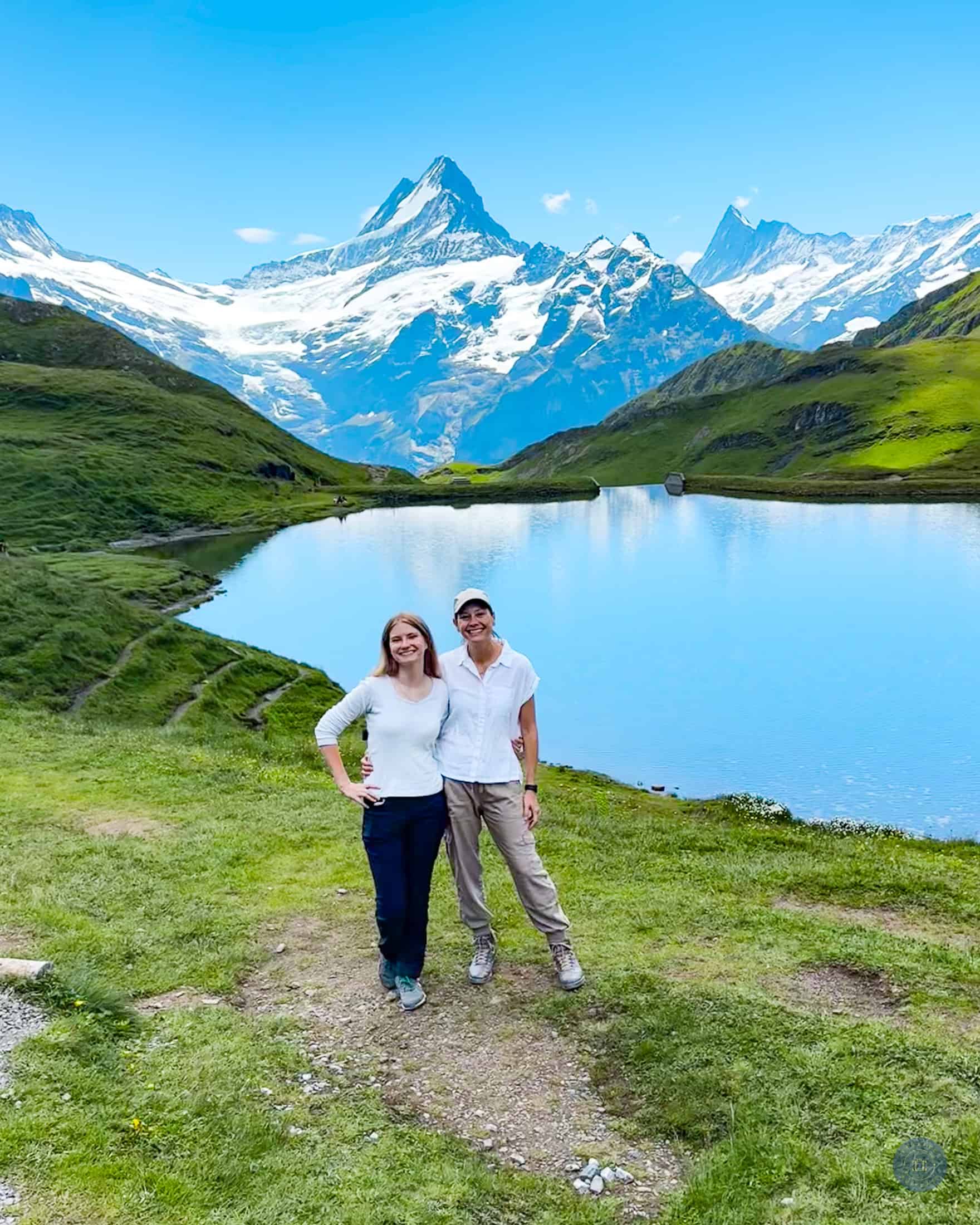 mother and daughter on hike to lake Bachalpsee near Grindelwald Switzerland