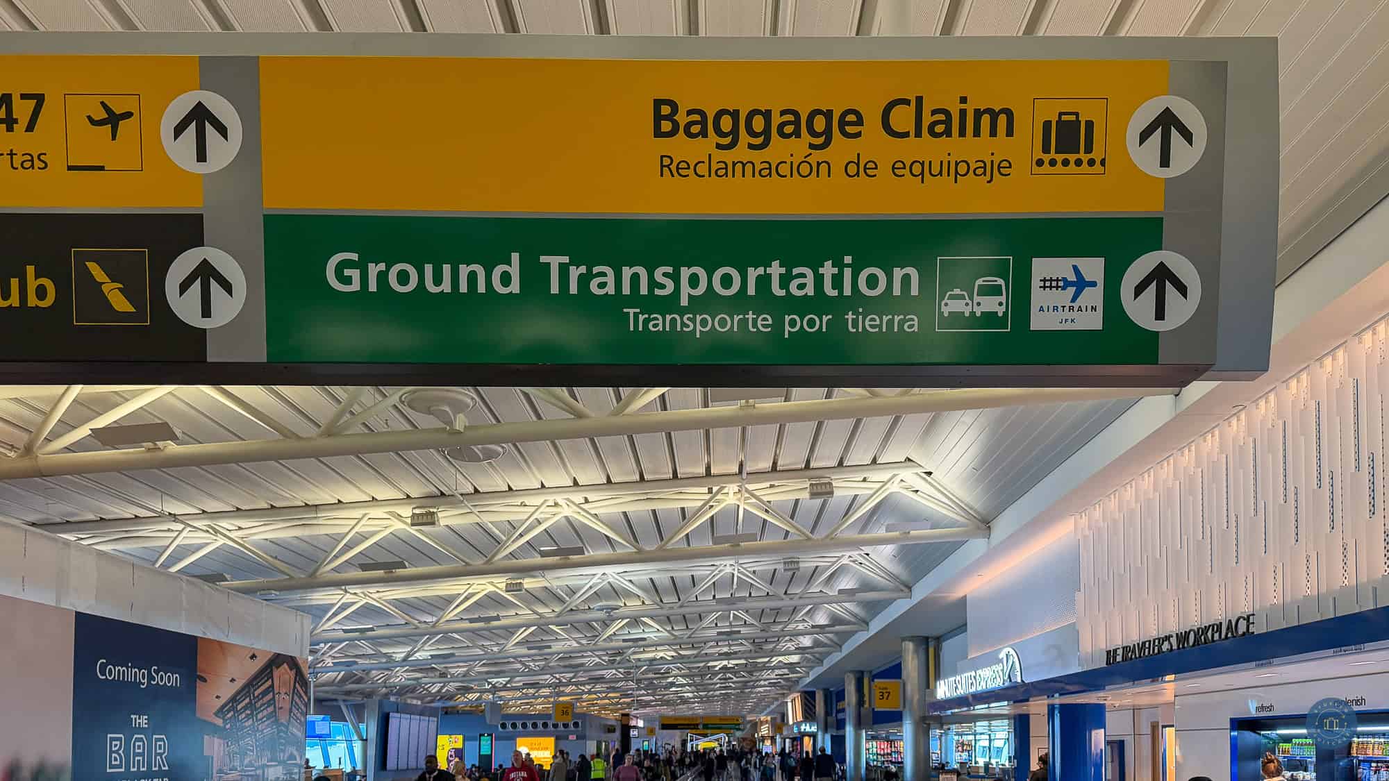 baggage claim airtrain signs in terminal 7 at jfk